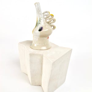Little sculptural pitcher on its stand